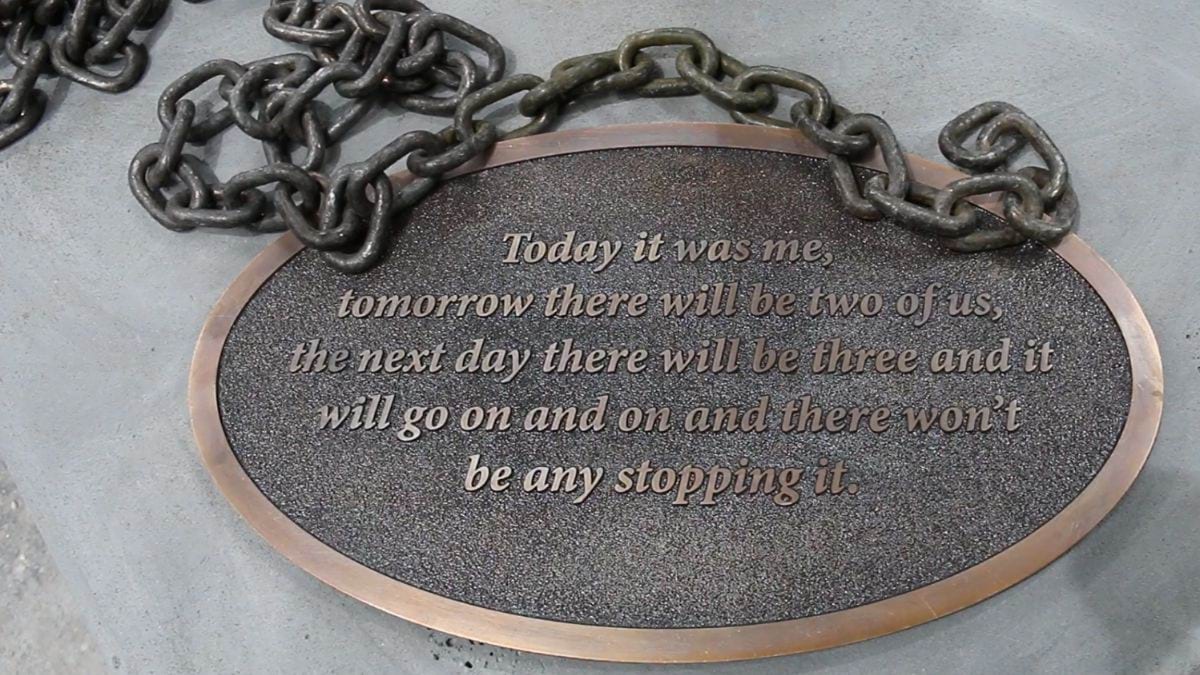 The plaque on the base of Zelda’s statue. It has her quote